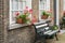 Windowsill with pink and red flowering Pelargonium plants