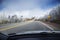 Windshield view of road in winter