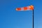 Windsock with blue sky