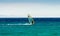 Windsurfer on the background of mountains rides on the waves of the Red Sea in Egypt Dahab South Sinai