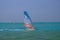 Windsurfer at Jibe City windsurfing in Bonaire clear skies
