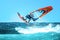 Windsurfer jumping in the waves in the Atlantic Ocean