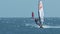 Windsurfer Jumps on Board Turning and Falls down