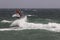 Windsurfer makes a jump in the air.