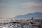 Windsurfer silhouette in Thracian sea at winter