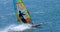 Windsurfer travelling at speed on the Ocean.