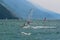 Windsurfer wearing required safety vest at alpine Lake Garda  Torbole, Italy