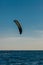 windsurfing at sea, black parachute