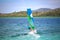 Windsurfing in the warm emerald green Caribbean water Trois-Ilets, Martinique