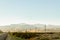 Windturbine field in California with mountains