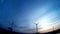 Windturbine / Wind Power with a blue sky and sunrise