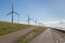 Windturbines along a Dutch near Urk