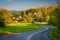 Windy country road and view of farms and houses in the Shenandoah Valley of Virginia.