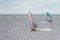 On a windy day many people take the opportunity to do watersports. Windsurfers gather near Lomma beach to practice their