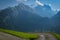 Windy road in Swiss Alps with majestic view on Wetterhorn peak