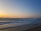 Windy Sunset at the beach in lÃ¸kken, Denmark. Colorful and moody light from the sun.