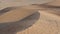 Windy weather at sand dunes in the desert