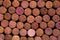 Wine background. Lots of bottle caps. Bark cork. Wine bottle corks