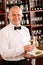 Wine bar waiter mature serve glass restaurant