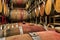 Wine barrels stacked in a cellar at a winery in Sonoma, USA