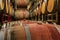 Wine barrels stacked in a cellar at a winery in Sonoma, USA