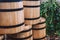 Wine barrels stand on the street close-up