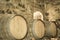 Wine barrels in stone cellar