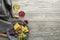 Wine bootle and glass with food on wooden table