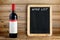 Wine bottle and blackboard for wine list
