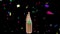 Wine Bottle Champagne with Confetti Falling on Black Background 4K Animation. Fireworks on Party night celebration