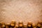 Wine bottle corks pattern on craft paper background top view copyspace. New Year celebration concept