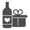 Wine Bottle And Gift Pack solid icon. Bottle with heart symbol and present with ribbon glyph style pictogram on white