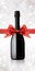 Wine bottle gift with ribbon