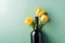 Wine bottle and white tulips on pastel background.