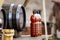 Wine bottles near wooden barrels