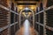 Wine bottles stacked up in underground wine cellar