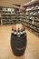 Wine bottles store barrels and shelves.