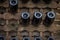 The wine bottles stored in a wood rack