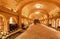 Wine bottles waiting for tasting time inside huge cellar Khareba Winery with underground brick tunnel