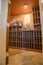 Wine cellar in California mansion below the stairs