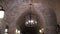 Wine cellar corridor brick vault design with chandelier