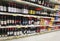 Wine cellar in super market shelf many bottles and wines