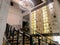 Wine cellar with wine bottle on shelf,classic indoor with wooden stairs and Chandelier