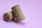 Wine cork two pieces on a pink background