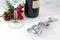 Wine corkscrew glass and christmas branch. close up