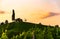 Wine country Vineyards in Austria, south Styria. Landscape sunset. Grape hill with windmill