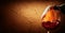 Wine on cracked clay background