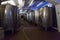 Wine fermentation tanks in the basement of a distillery