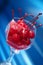 Wine glass holding maraschino cherries