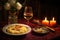 wine glass and risotto on a candlelit table